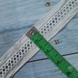 Buy high-quality 1.5-inch insertion lace trim in 1-metre length for apparel, ethnic wear, home décor, and DIY projects. Elegant design, soft fabric, and perfect finishing.